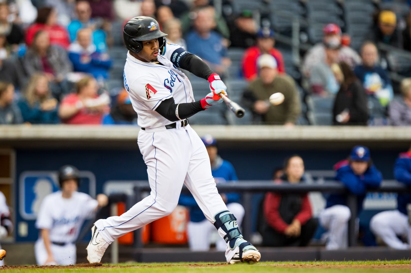 Deyvison De Los Santos hits the ball against the Midland RockHounds on May 3, 2024