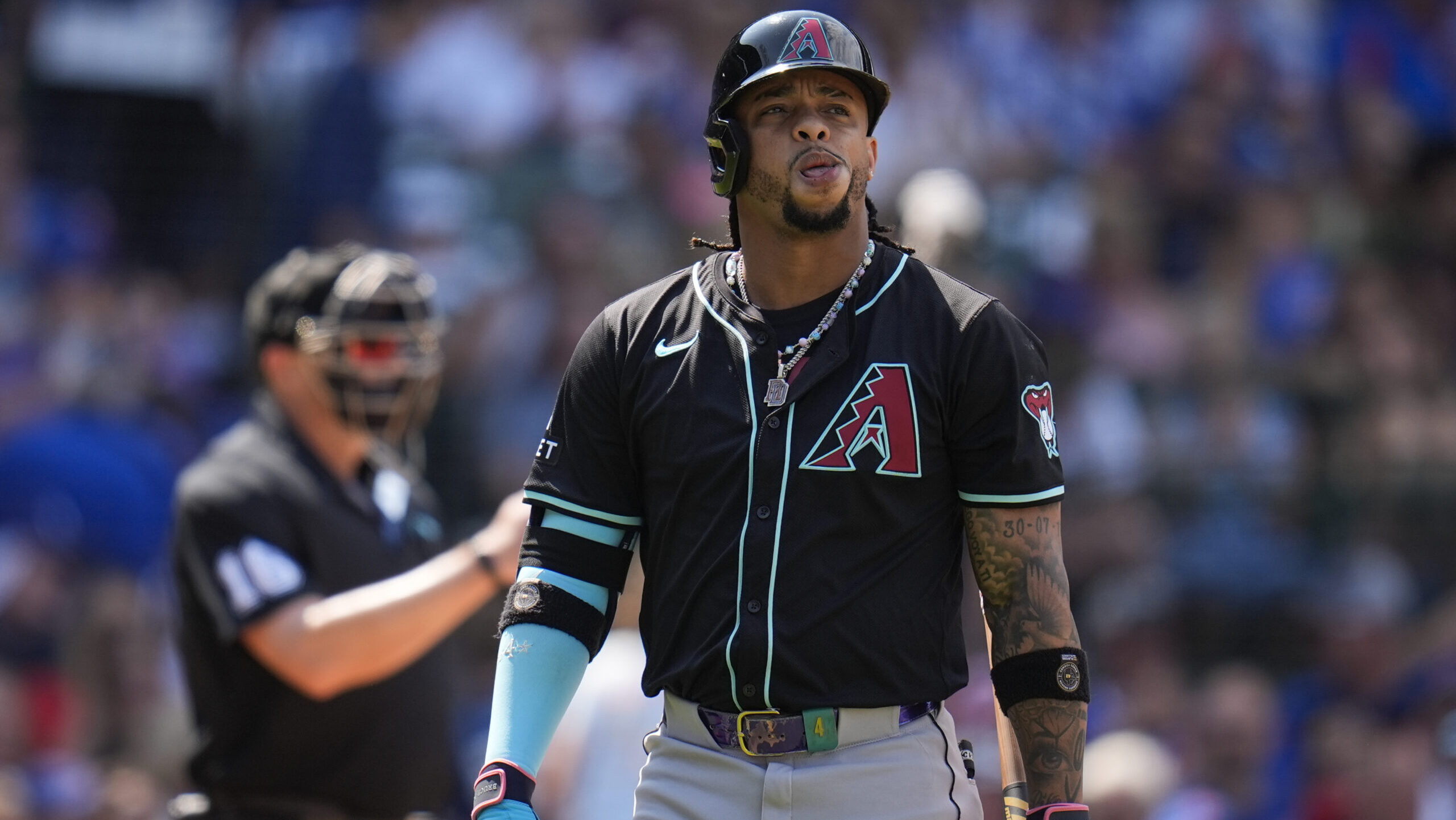 Nico Hoerner's bases-loaded walk in the 10th gives the Cubs a victory over the D-backs