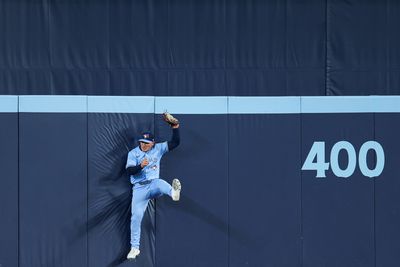Daulton Varsho makes a leaping catch against the wall for the Blue Jays against the Red Sox on May 1