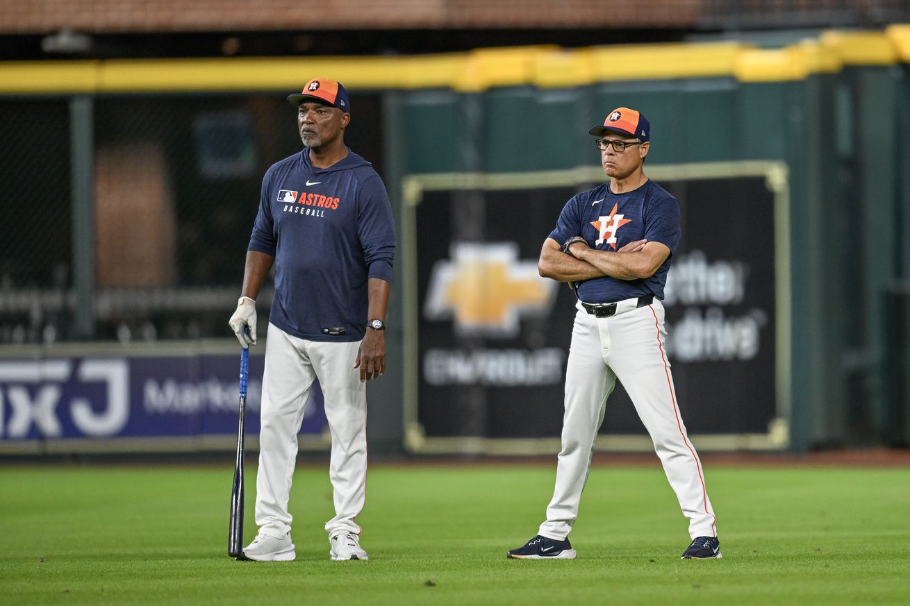 Tony Perezchica, Astros third base coach.
