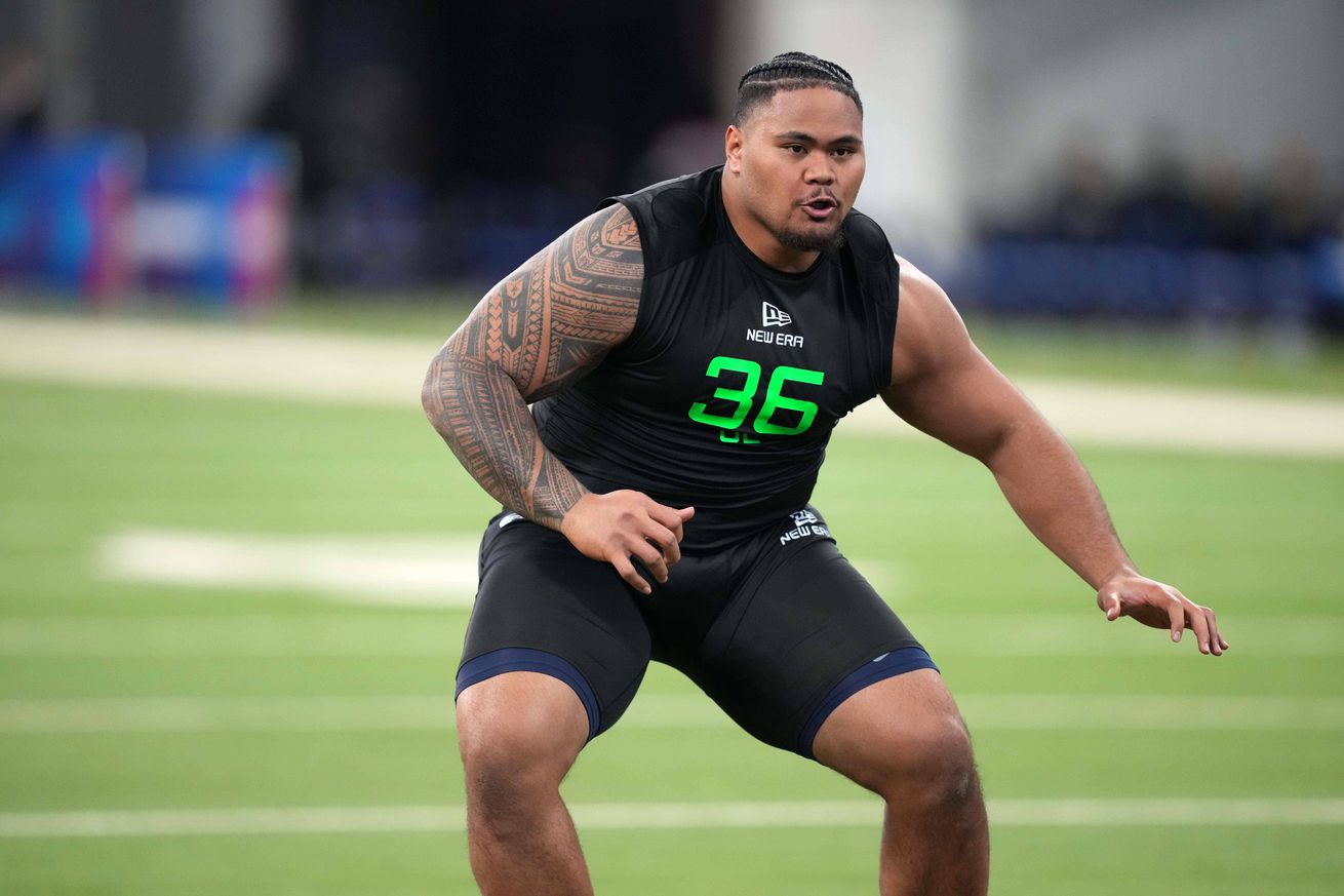 arizona-wildcats-football-jonah-savaiinaea-miami-dolphins-nfl-draft-rookie-contract-guaranteed-2025