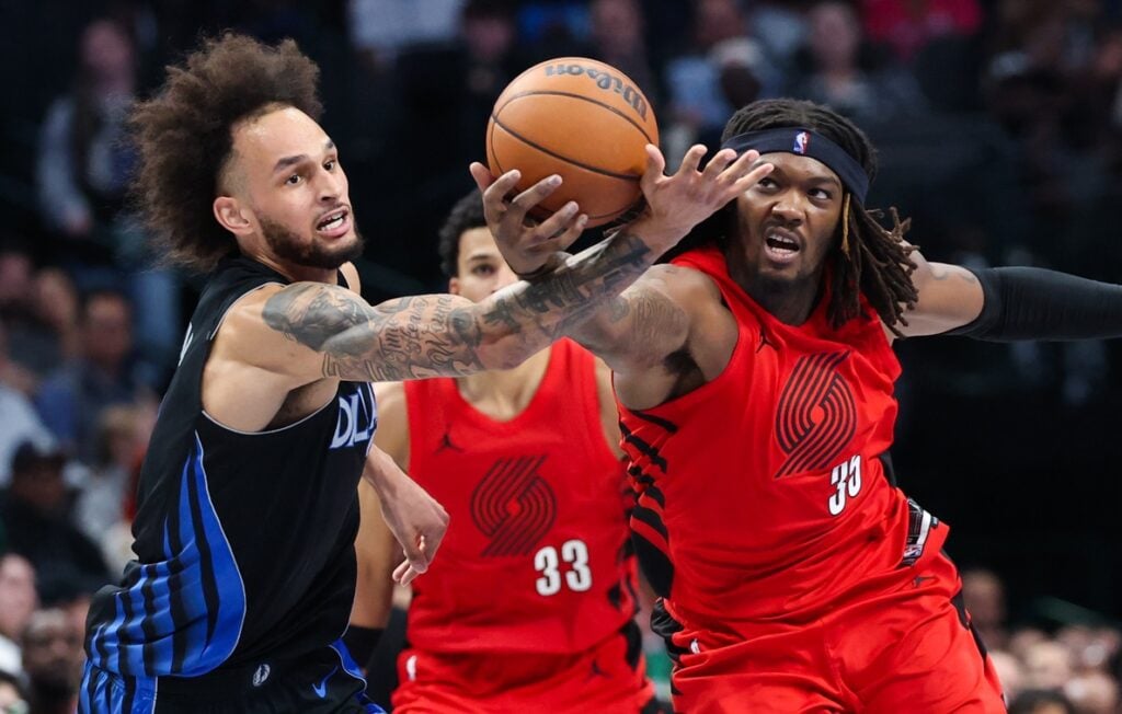 Portland Trail Blazers center Robert Williams III (35) and Dallas Mavericks center Dereck Lively II (2) battle for the ball during the second half at American Airlines Center.